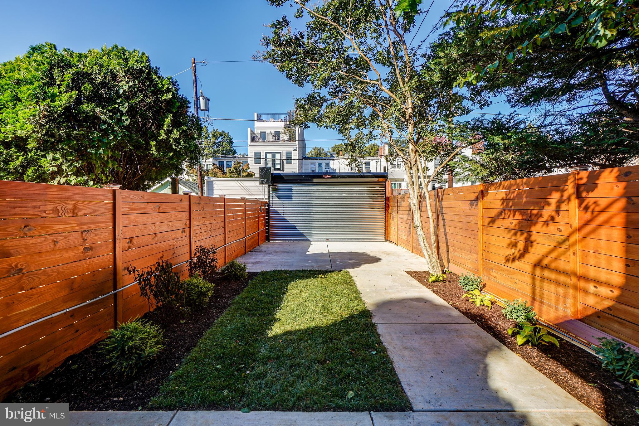 3615 S Street Northwest Washington, DC 20007 - Photo 47 of 48 Two-car parking with remote roll-up door