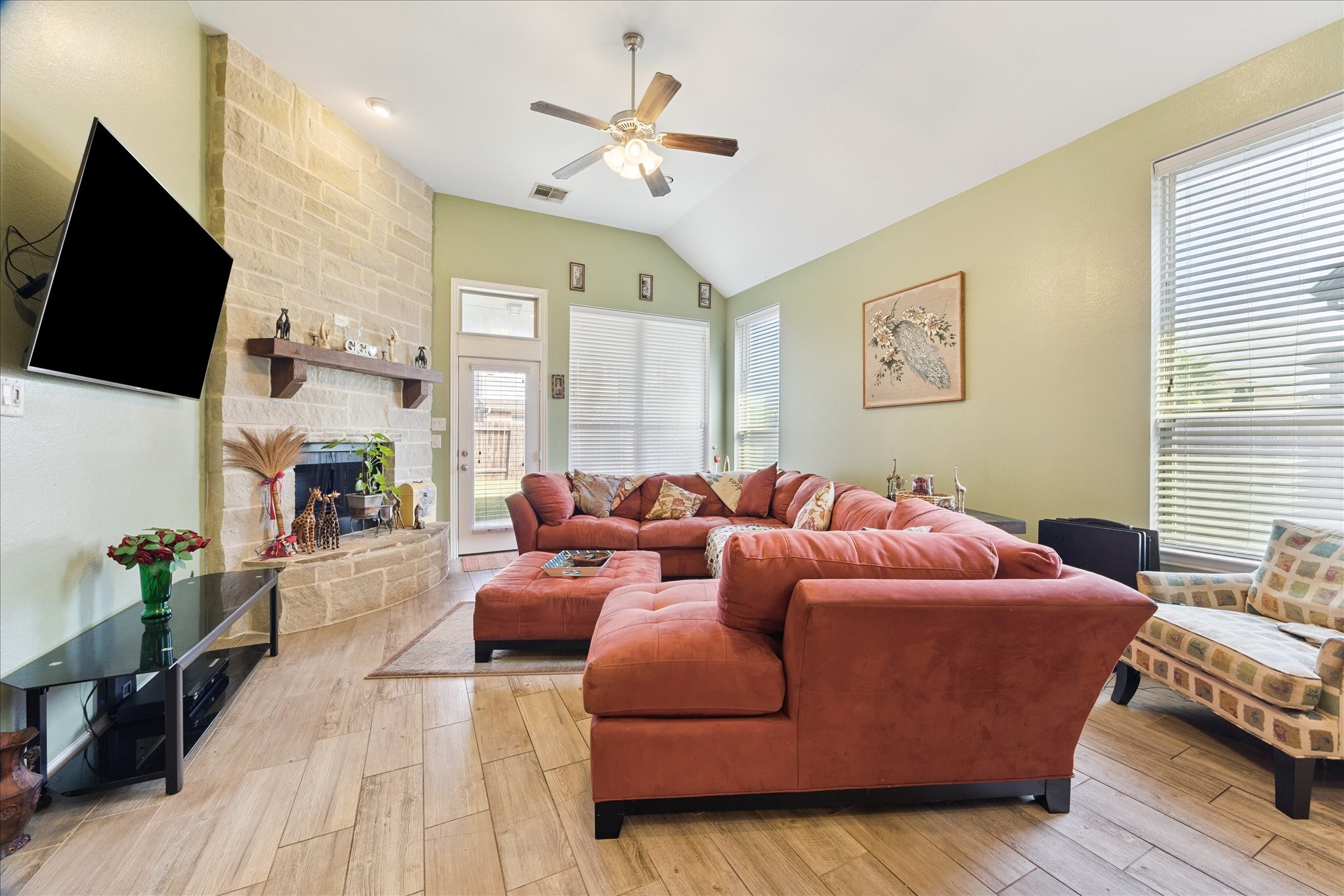 13117 Green Shores Lane Rosharon, TX 77583 - Photo 12 of 30 a living room with furniture and a flat screen tv