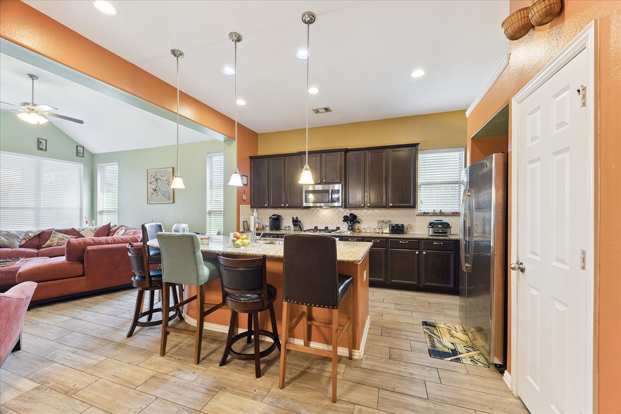 13117 Green Shores Lane Rosharon, TX 77583 - Photo 15 of 30 a large kitchen with a table and chairs