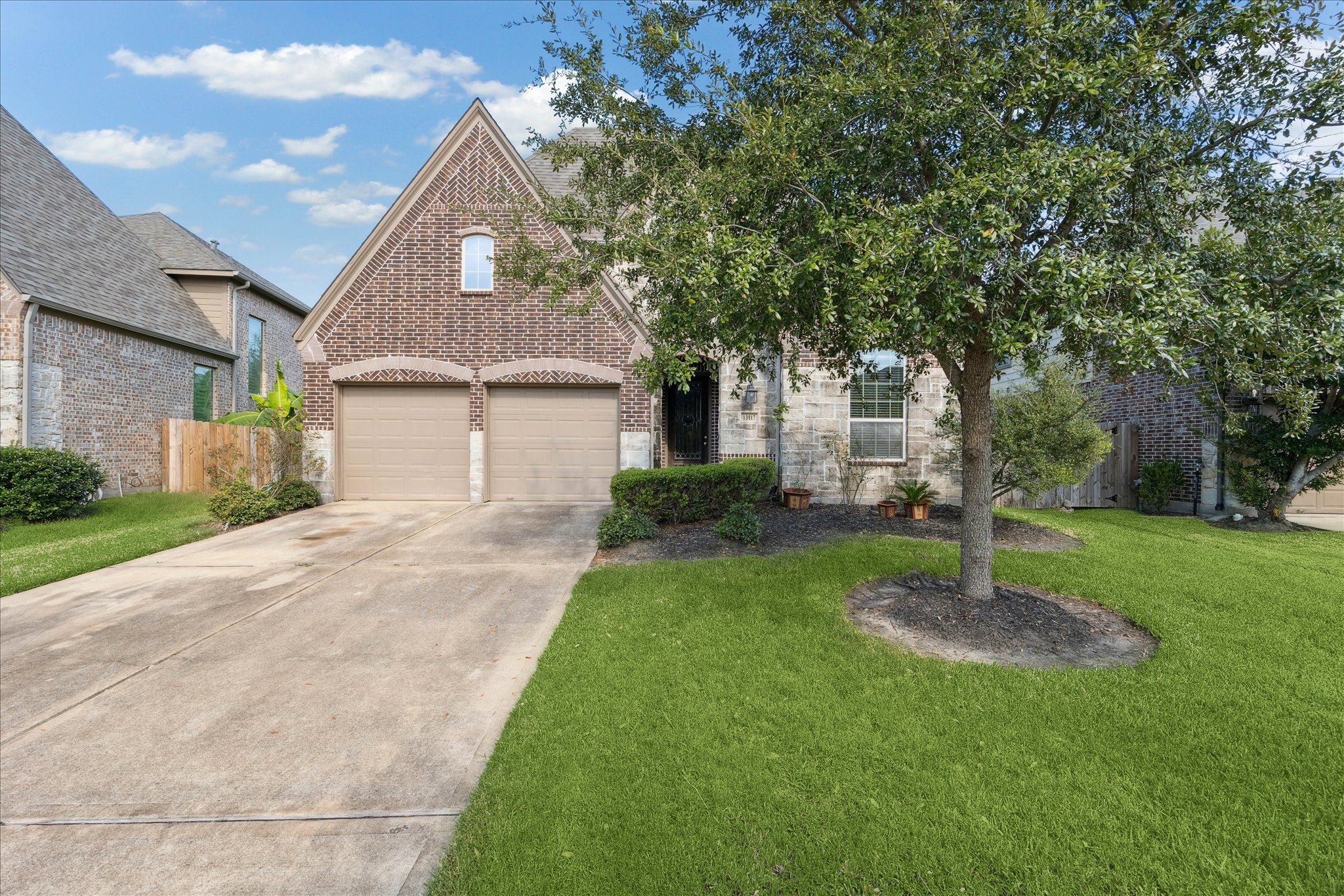 13117 Green Shores Lane Rosharon, TX 77583 - Photo 2 of 30 a front view of a house with a yard