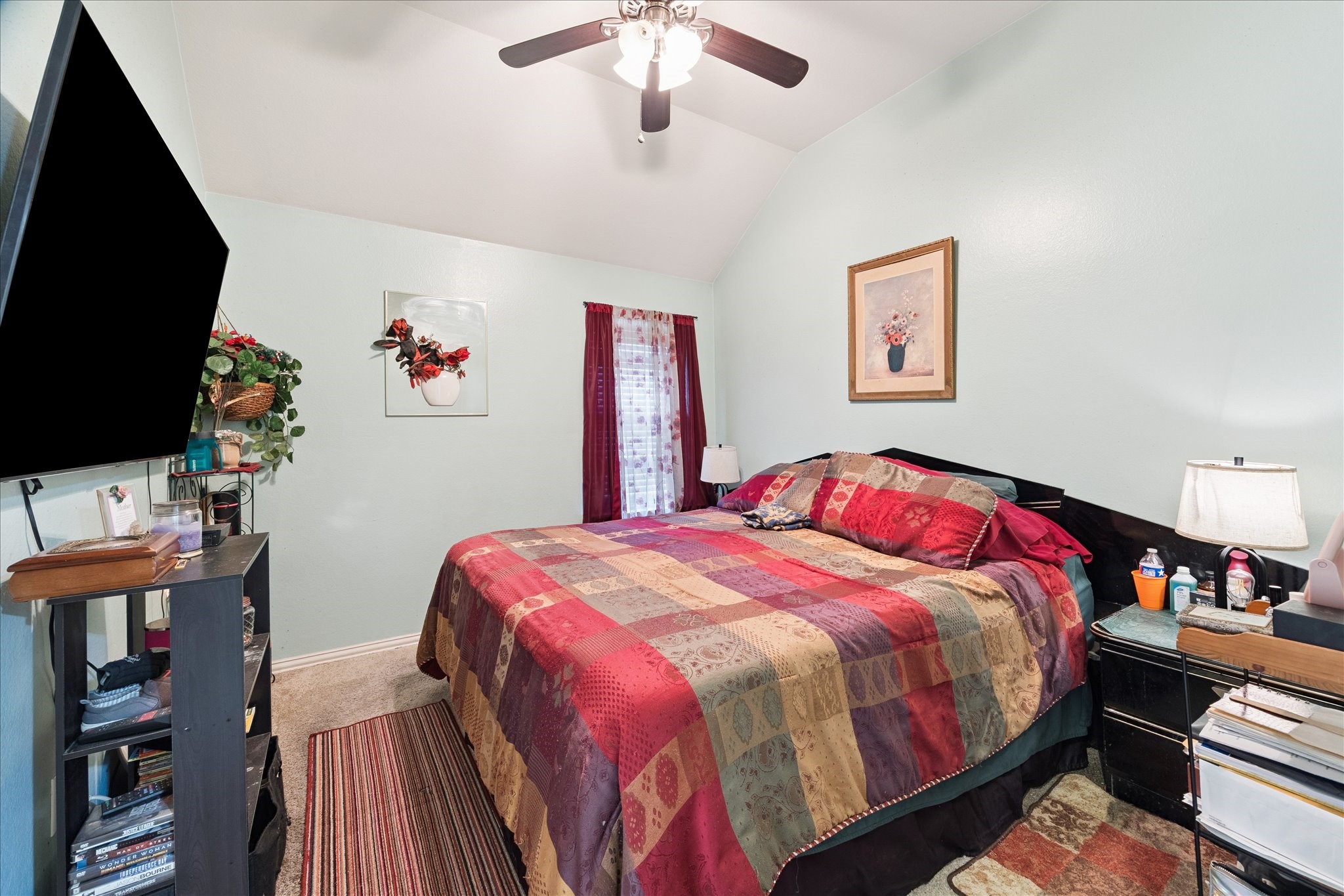 13117 Green Shores Lane Rosharon, TX 77583 - Photo 24 of 30 a bedroom with a bed and a flat screen tv