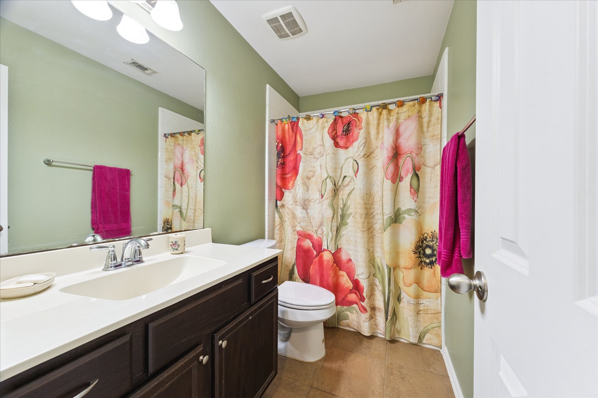 13117 Green Shores Lane Rosharon, TX 77583 - Photo 27 of 30 a bathroom with a sink vanity mirror and toilet