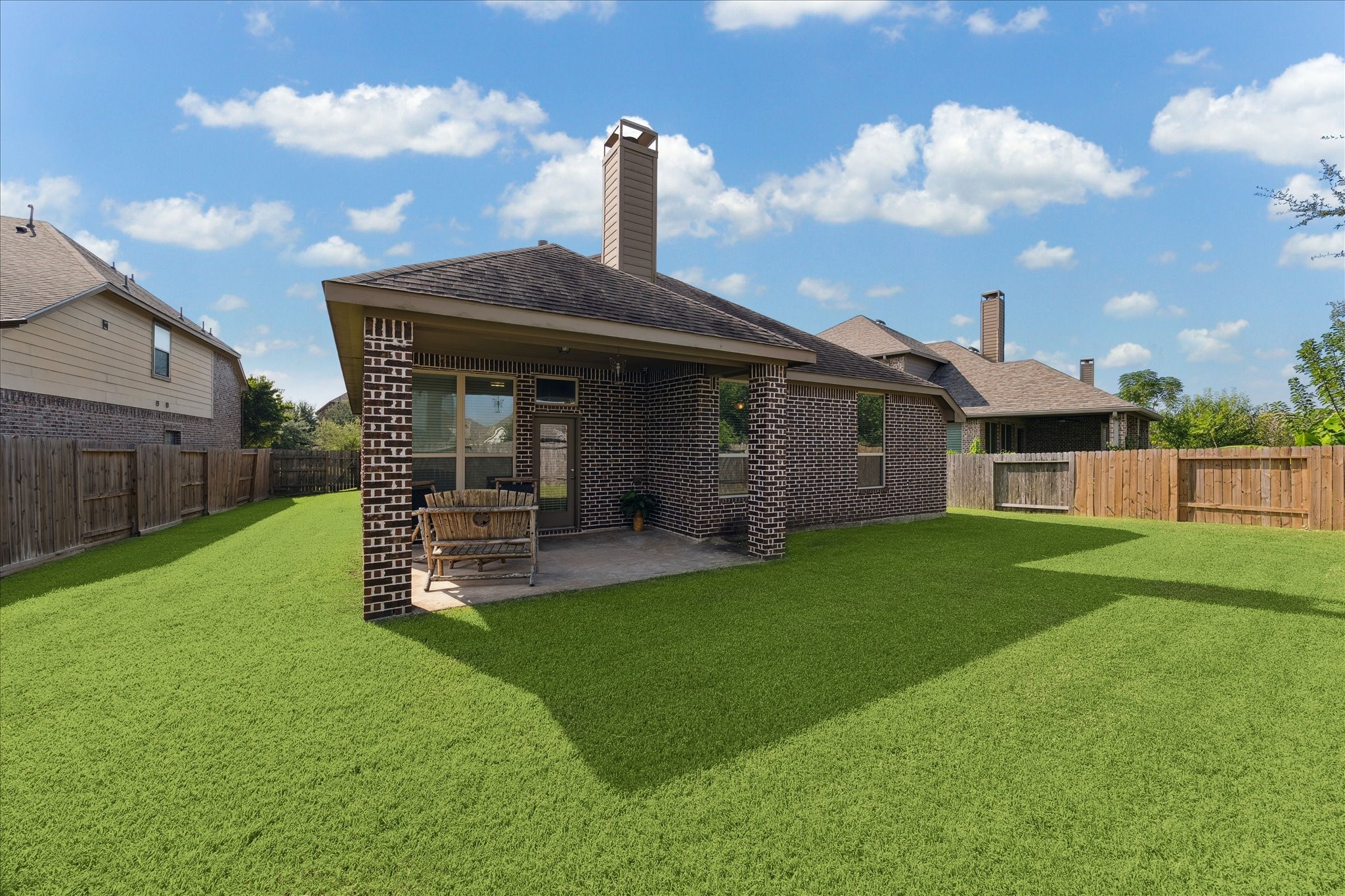 13117 Green Shores Lane Rosharon, TX 77583 - Photo 30 of 30 a view of a house with backyard and porch