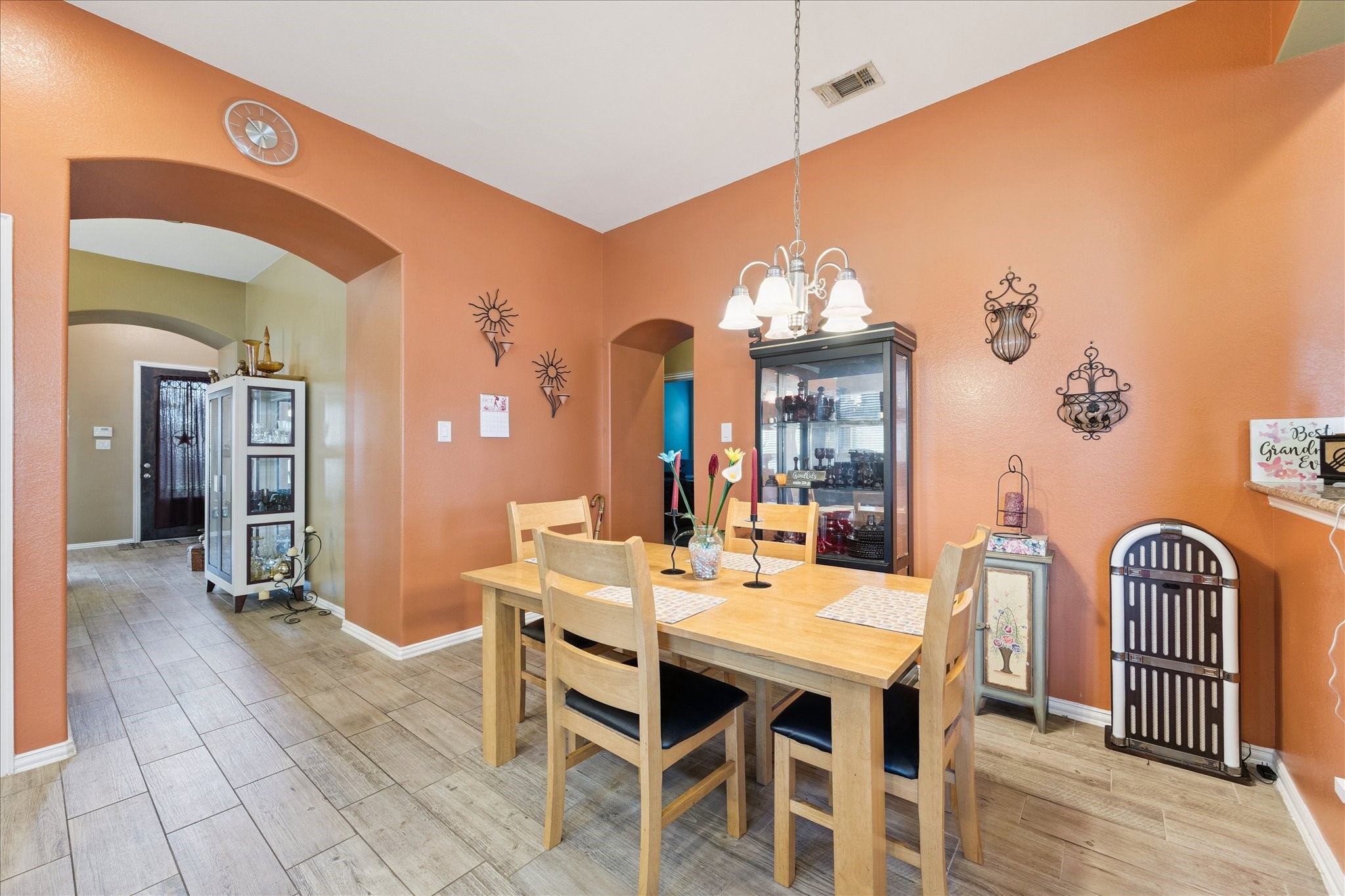 13117 Green Shores Lane Rosharon, TX 77583 - Photo 7 of 30 a view of a dining room with furniture and chandelier