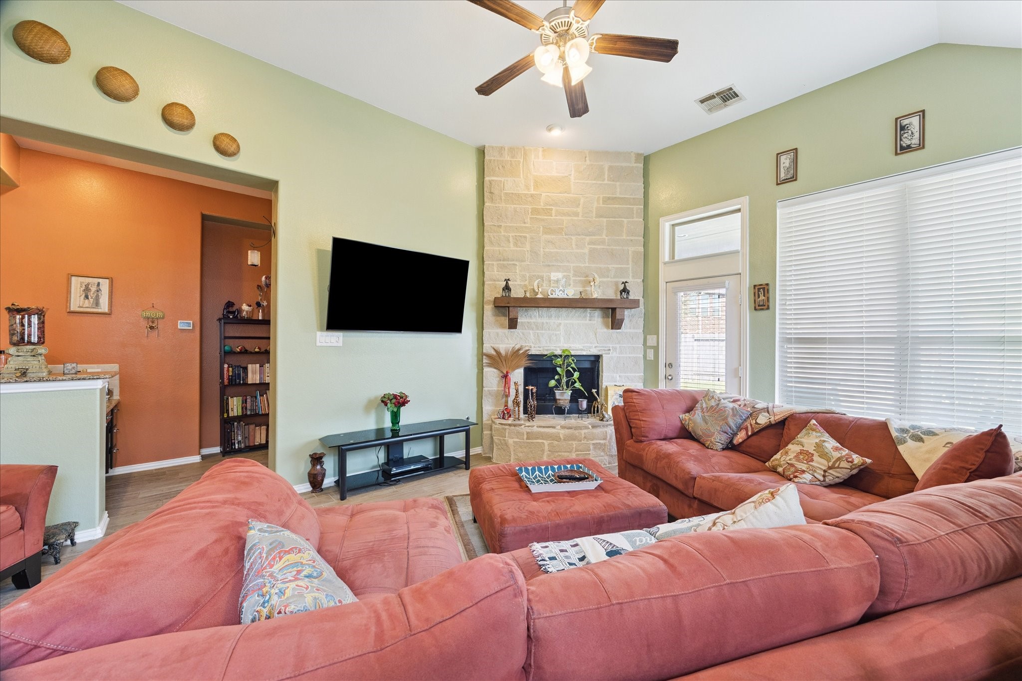 13117 Green Shores Lane Rosharon, TX 77583 - Photo 10 of 30 a living room with furniture and a flat screen tv
