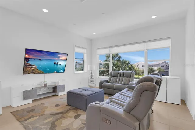 a bathroom with a toilet sink and window