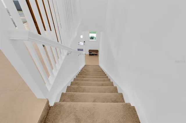 a work room with furniture and musical instruments