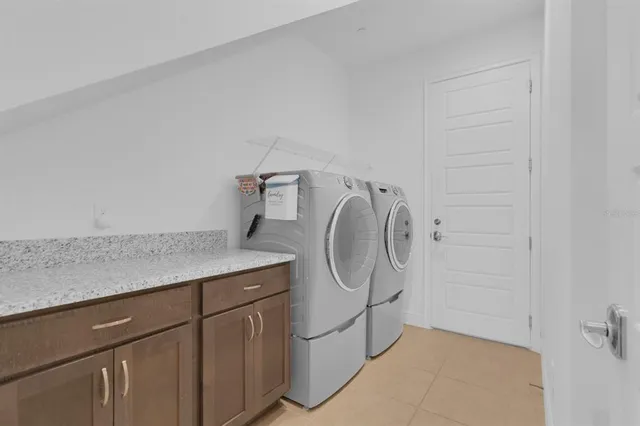 a storage room with washer and dryer