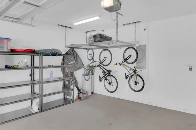 a yellow house with trees in front of it