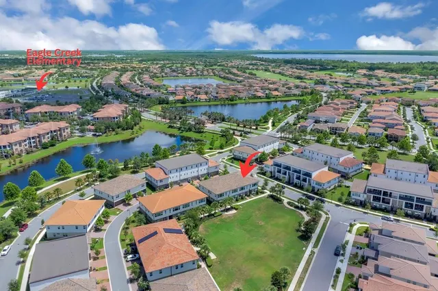 a view of a dining room with furniture and a livingroom