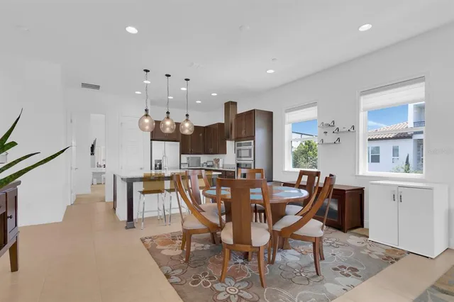 a view of a dining room with furniture