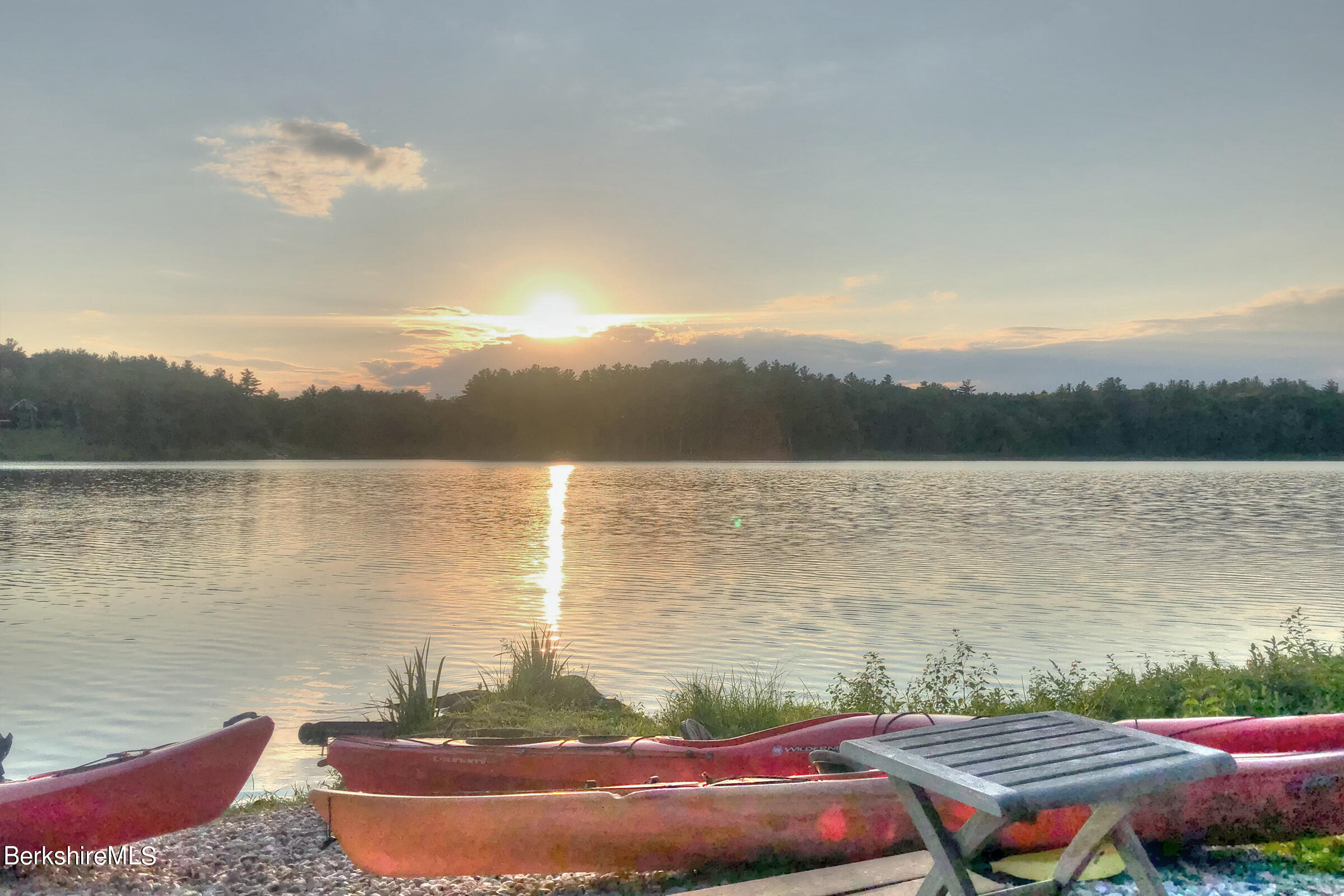 707 Stratford Road New Marlborough, MA 01259 - Photo 14 of 72 a view of a lake with houses in the back