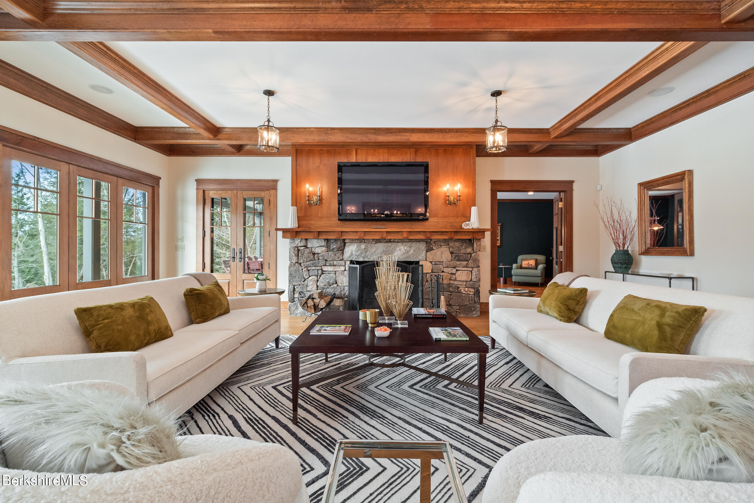 707 Stratford Road New Marlborough, MA 01259 - Photo 26 of 72 a living room with furniture and a fireplace
