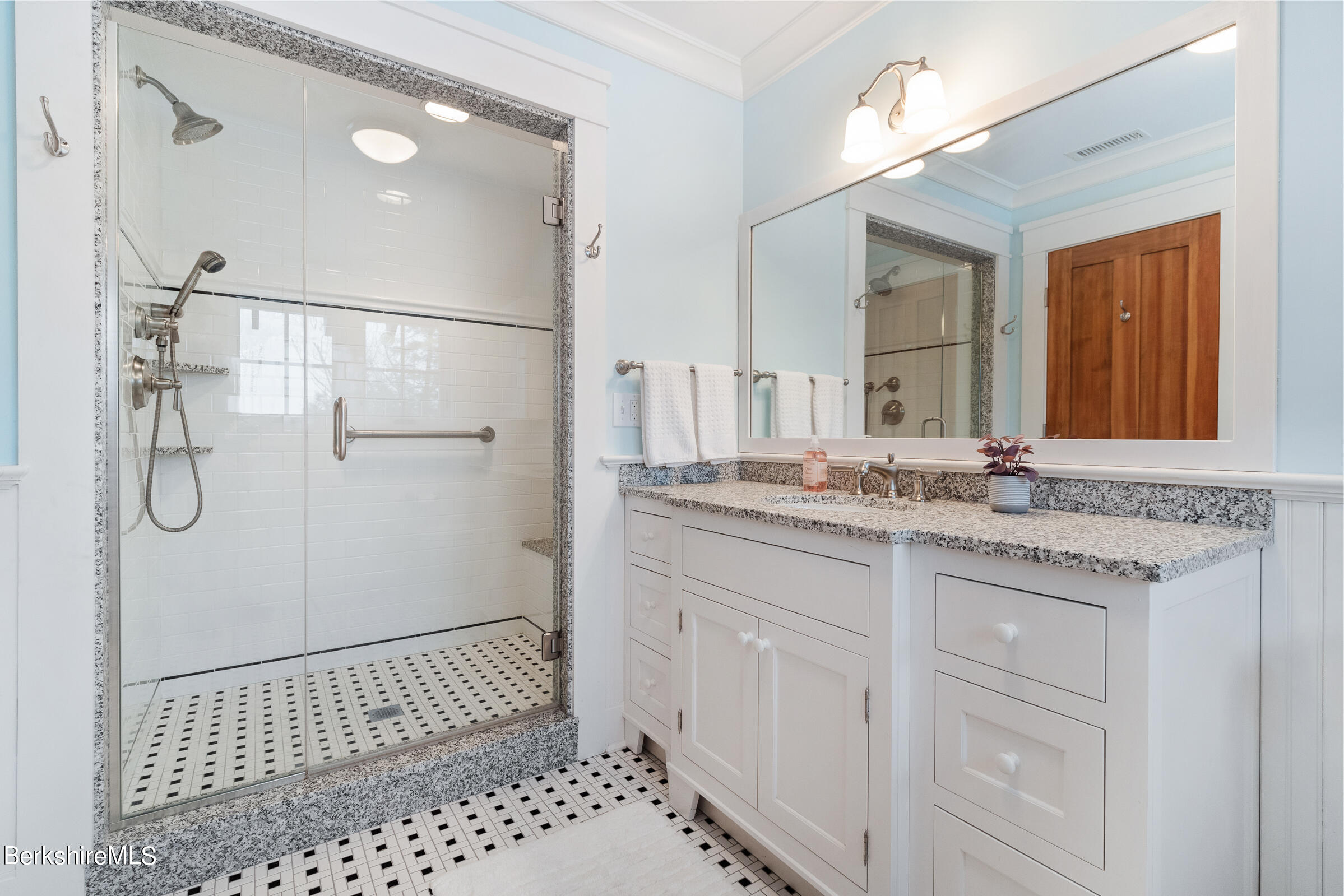 707 Stratford Road New Marlborough, MA 01259 - Photo 54 of 72 a bathroom with a sink a granite counter and shower