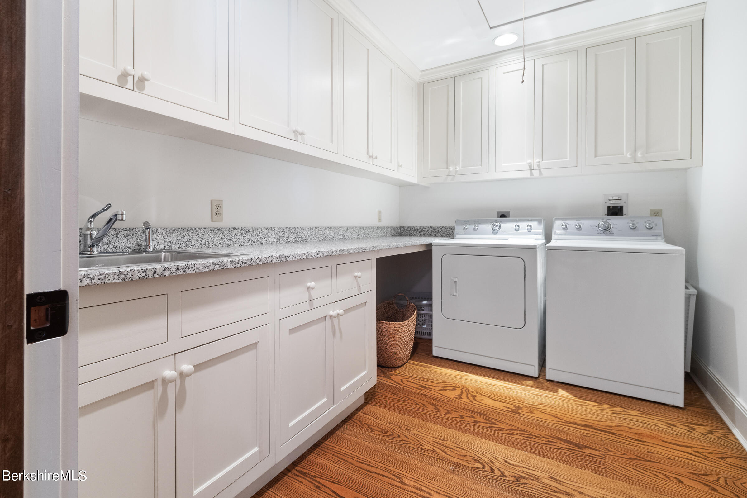 707 Stratford Road New Marlborough, MA 01259 - Photo 60 of 72 a kitchen with granite countertop white cabinets and white appliances