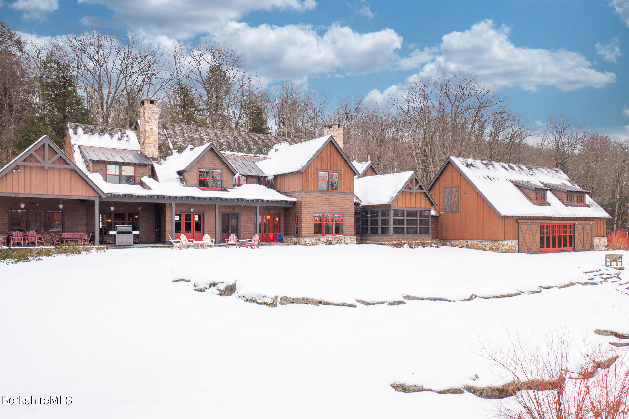 707 Stratford Road New Marlborough, MA 01259 - Photo 70 of 72 a front view of a house with a yard covered in snow