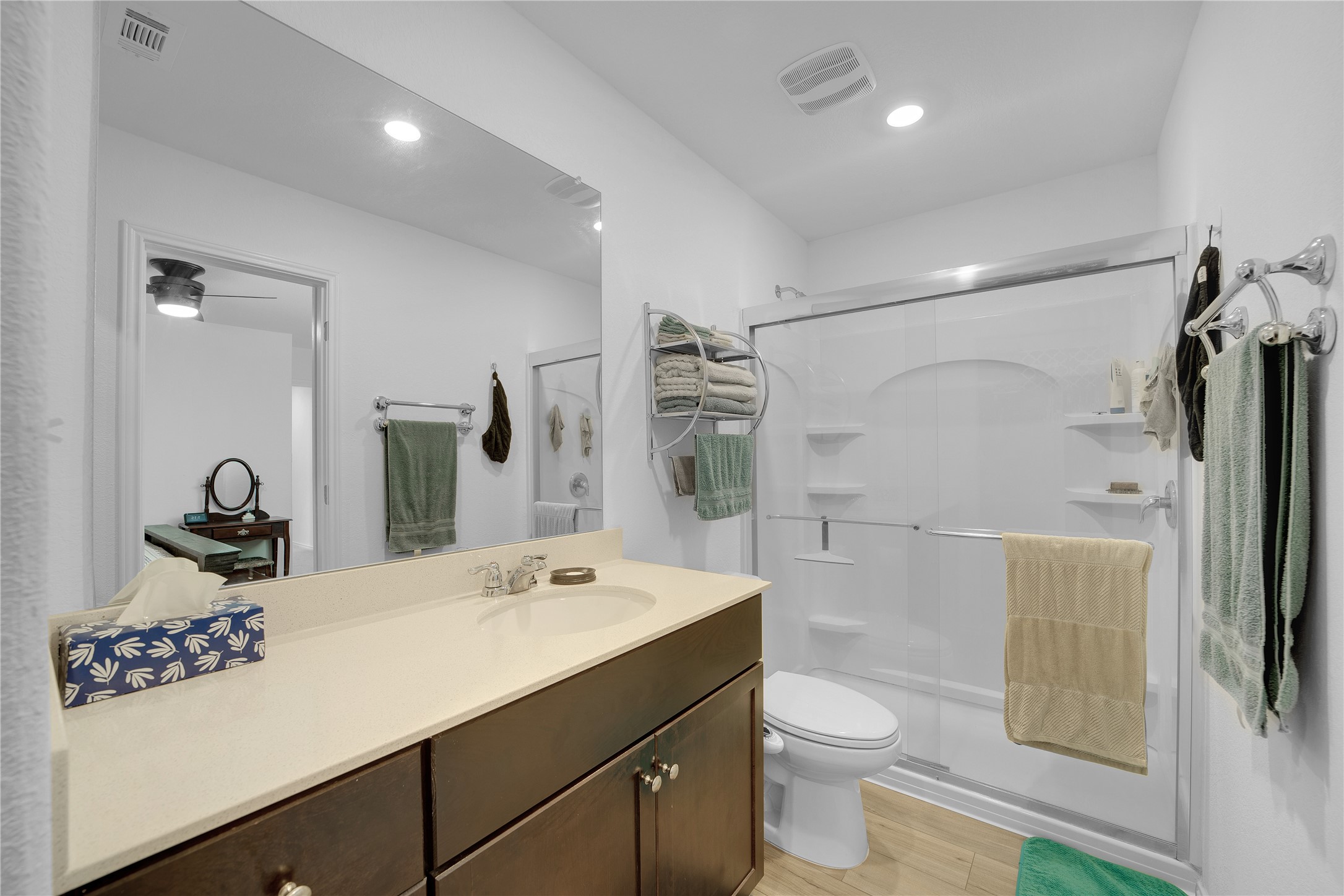 36 Trinity Circle Lockhart, TX 78644 - Photo 29 of 36 a bathroom with a double vanity sink toilet and shower