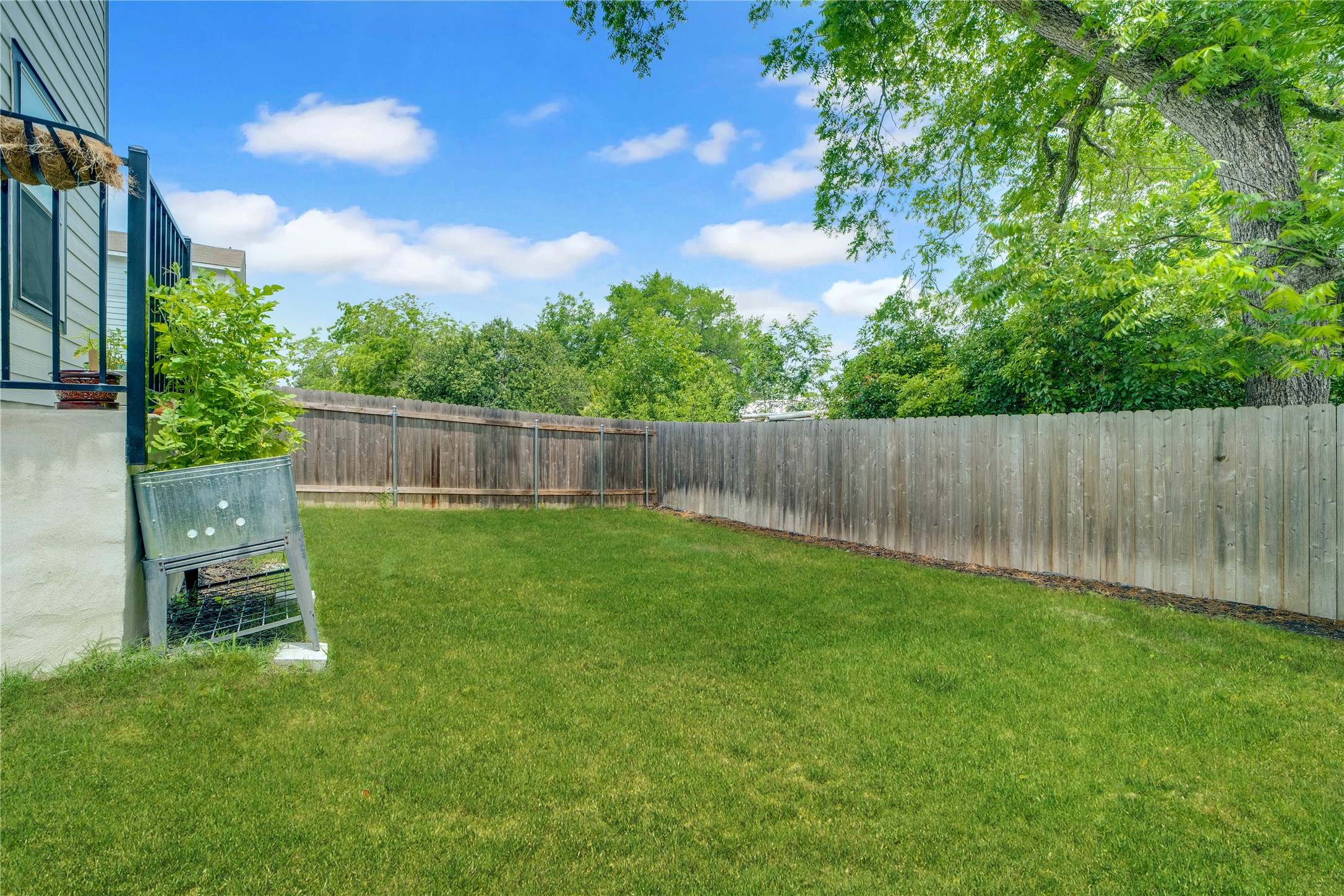 36 Trinity Circle Lockhart, TX 78644 - Photo 34 of 36 a garden with wooden fence