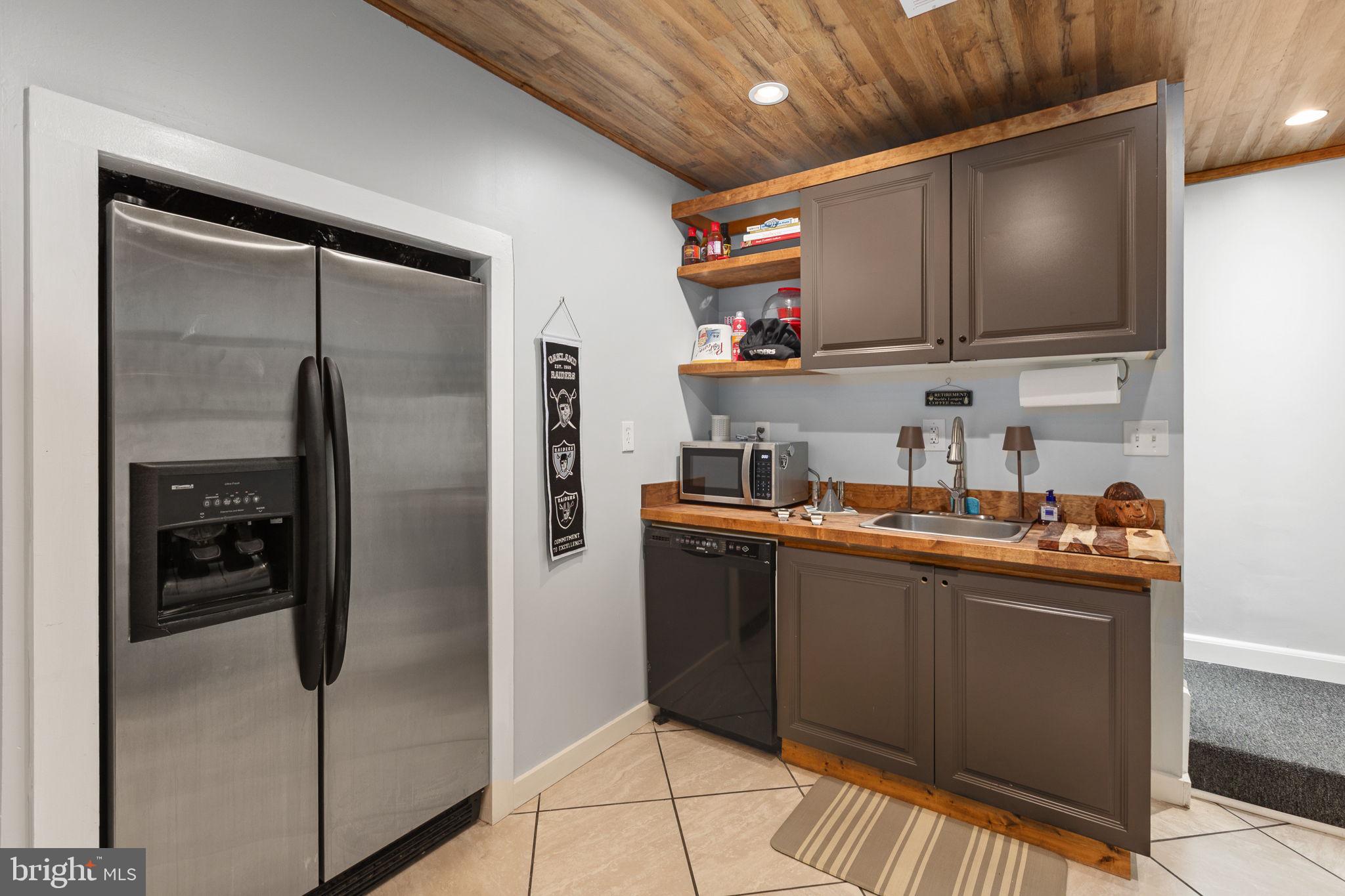 22088 Landora Bridge Road Ruther Glen, VA 22546 - Photo 83 of 122 Modern kitchen with sleek finishes.