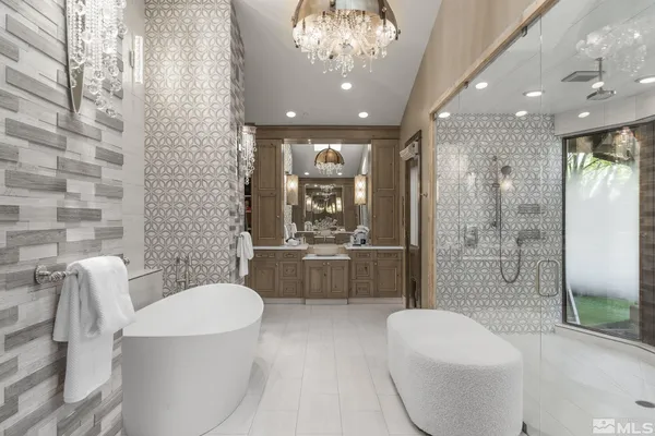 a bathroom with a toilet a sink and bathtub