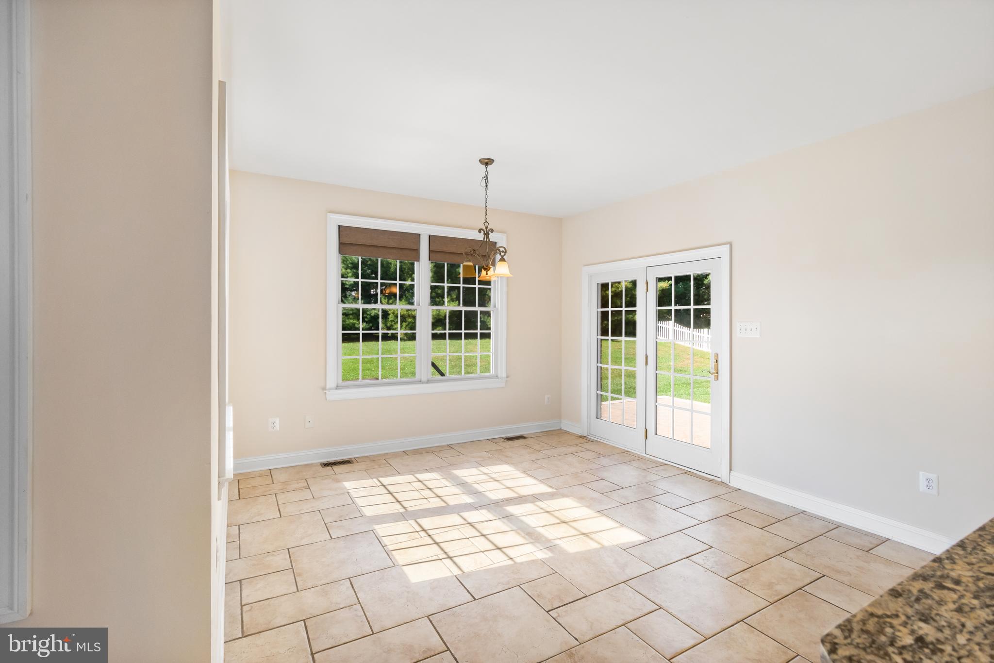 14389 Howard Road Dayton, MD 21036 - Photo 25 of 82 Breakfast Room with Door to Rear Yard and Patio