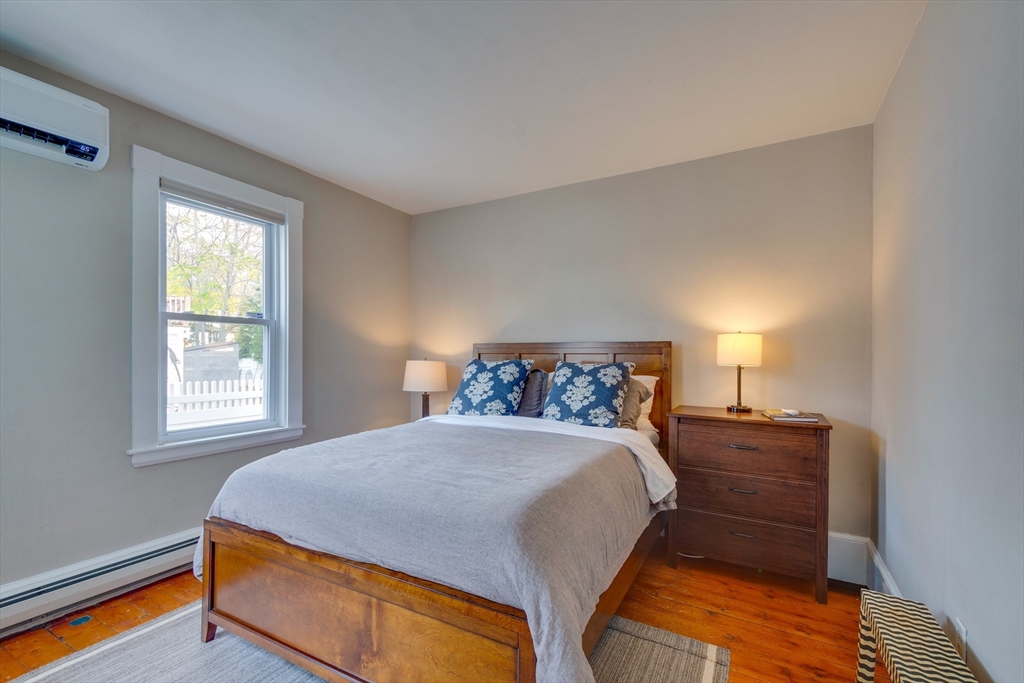 10 Eaton Street Reading, MA 01867 - Photo 12 of 15 a bedroom with a bed and window