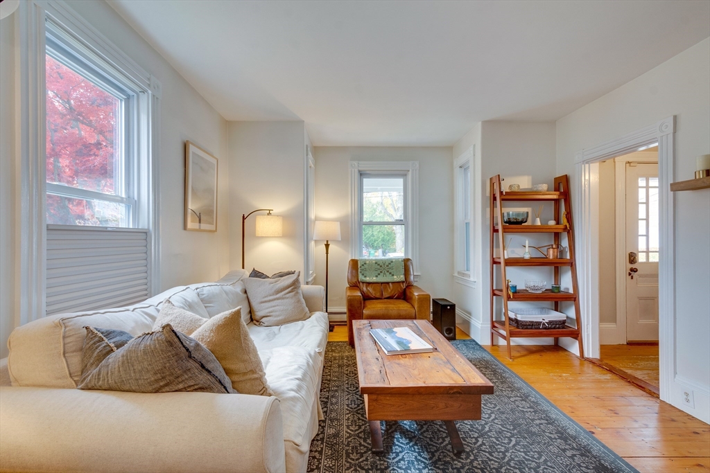 10 Eaton Street Reading, MA 01867 - Photo 6 of 15 a living room with furniture and wooden floor