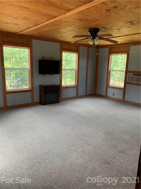 1787 St John Church Road Patrick, SC 29584 - Photo 20 of 48 a view of a livingroom with an empty space and a window
