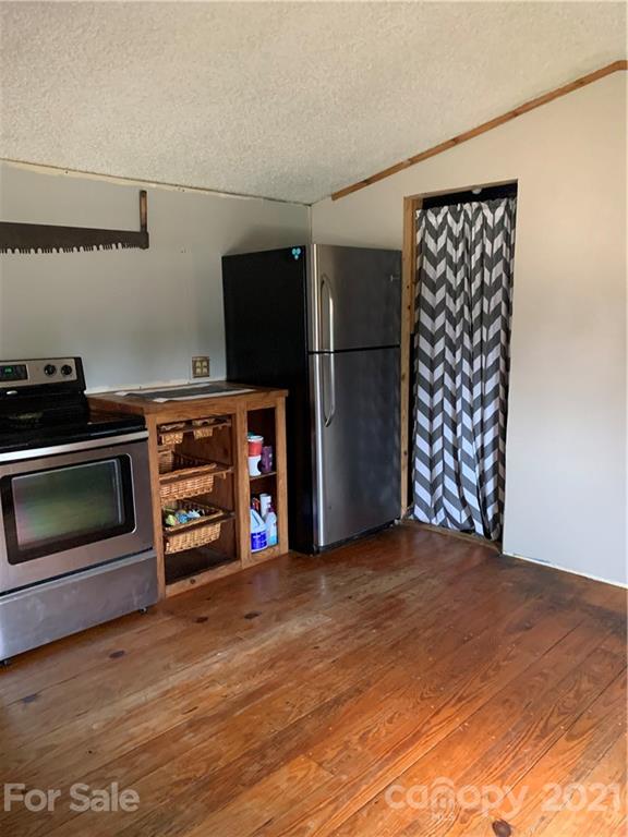 1787 St John Church Road Patrick, SC 29584 - Photo 24 of 48 a view of a kitchen with a stove