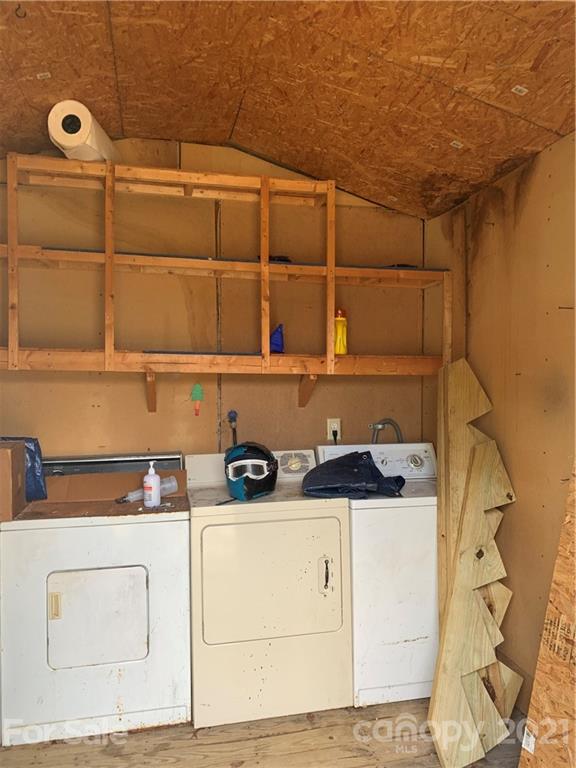 1787 St John Church Road Patrick, SC 29584 - Photo 42 of 48 a storage room with washer and dryer