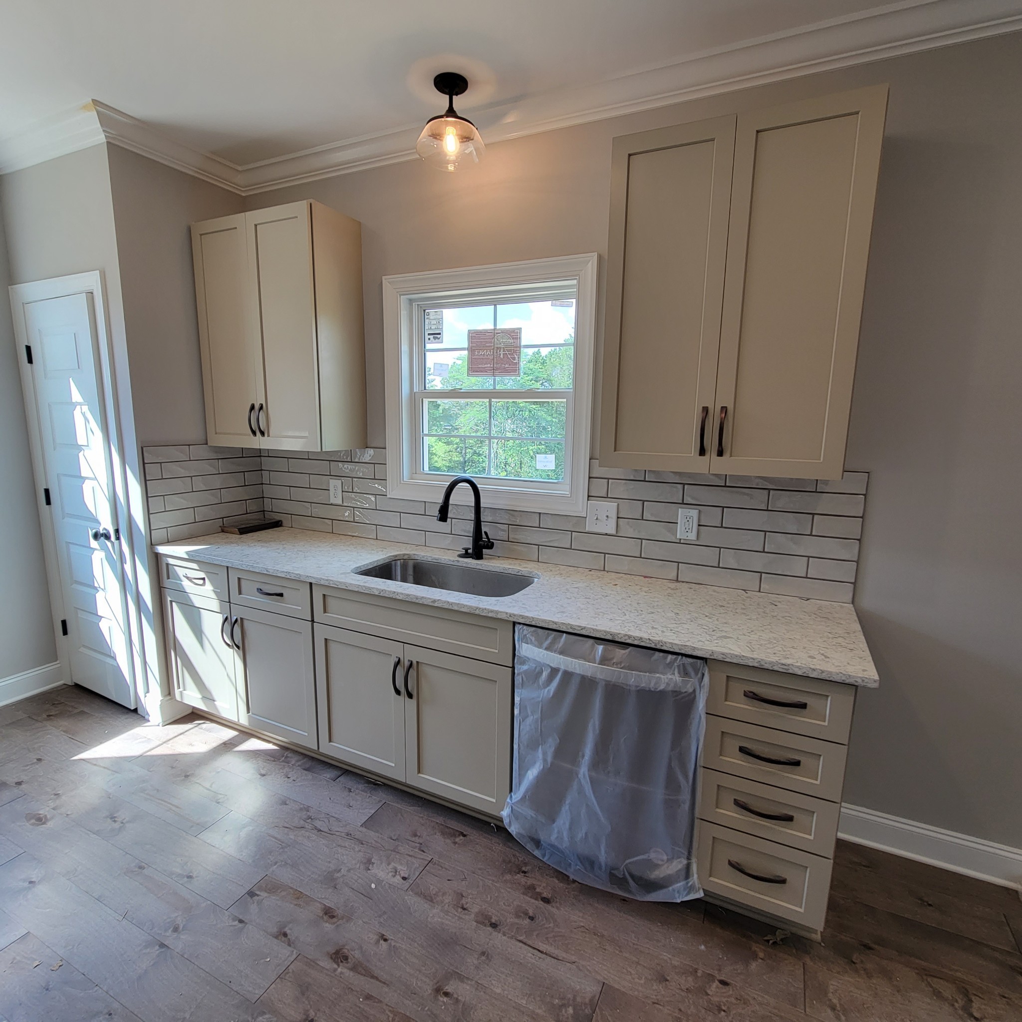 815 Ridgestone Place Lebanon, TN 37087 - Photo 3 of 16 a kitchen with sink cabinets and window