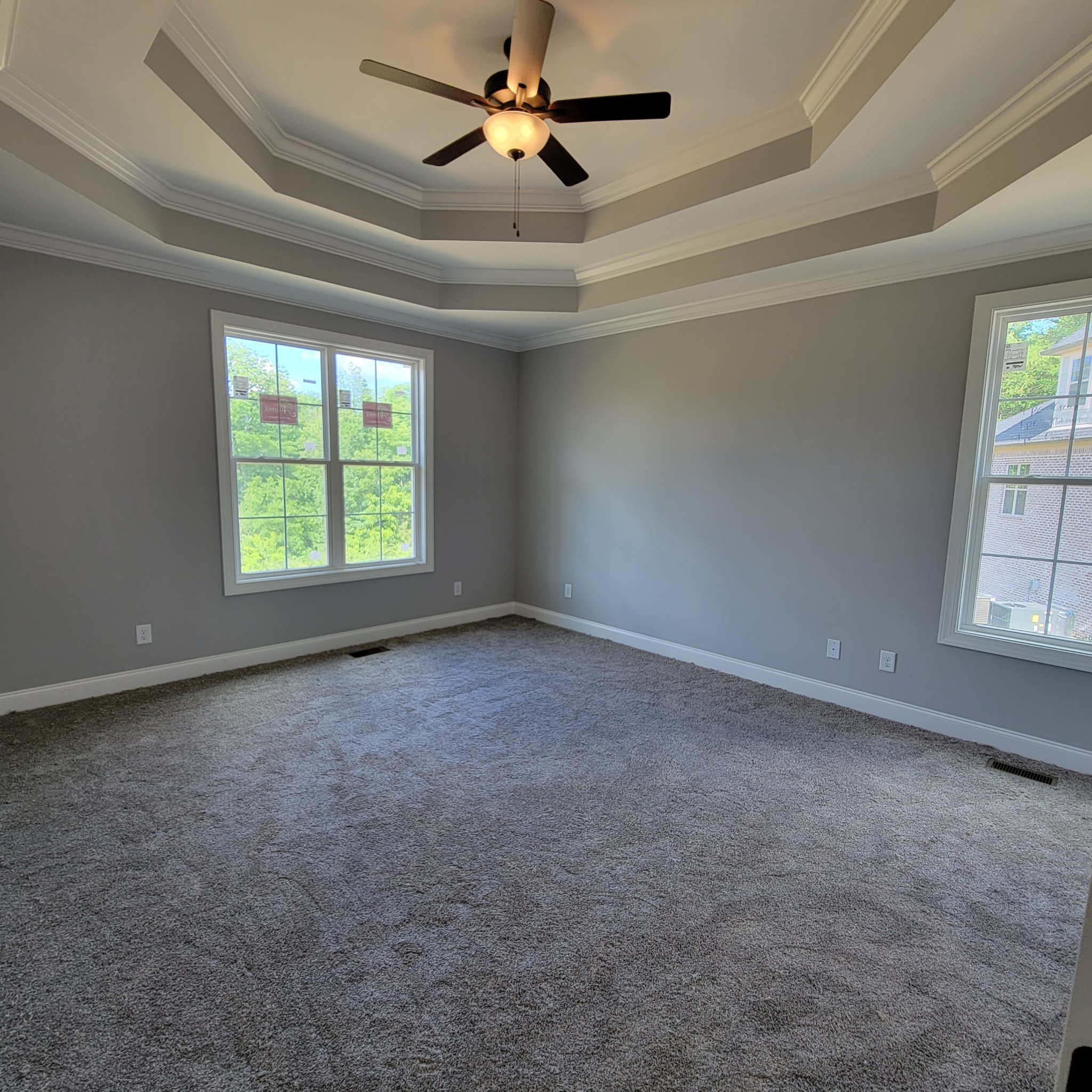 815 Ridgestone Place Lebanon, TN 37087 - Photo 7 of 16 an empty room with windows and fan