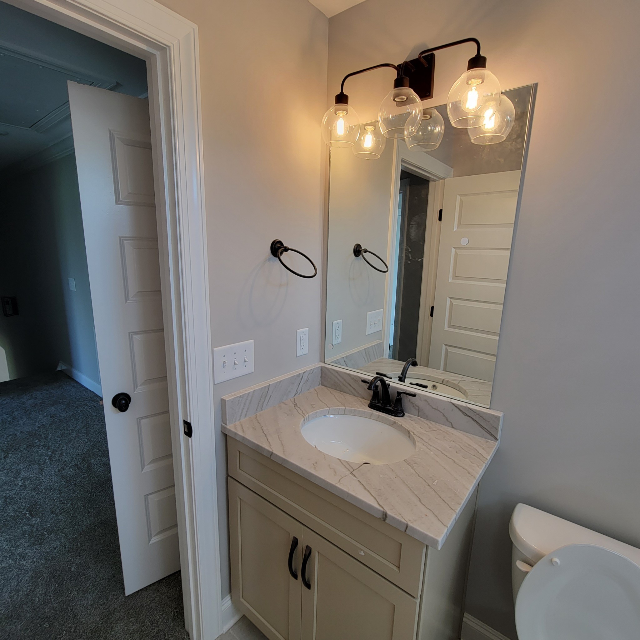 815 Ridgestone Place Lebanon, TN 37087 - Photo 10 of 16 a bathroom with a sink a toilet and shower