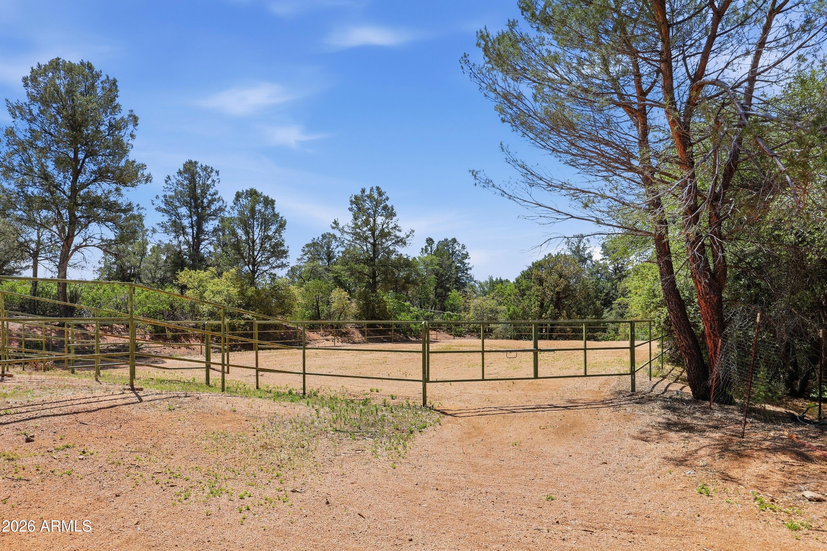 1405 East Graham Rnch Trail Payson, AZ 85541 - Photo 37 of 46 a view of a yard with wooden fence