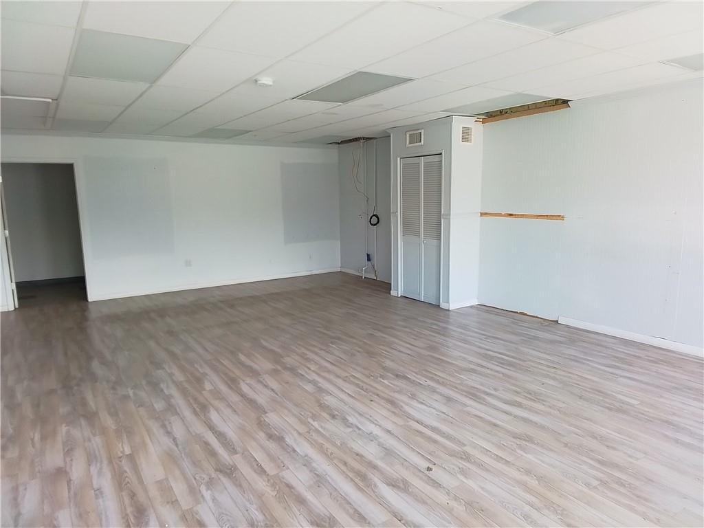 6126 Saltsburg Road Penn Hills, PA 15235 - Photo 3 of 4 a view of empty room with wooden floor