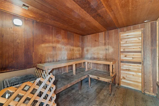 a bedroom with a bed and furniture