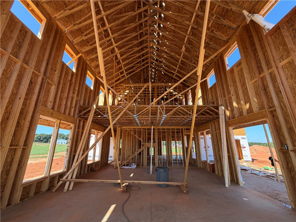 113 Dorchester Road Belton, SC 29627 - Photo 6 of 12 Dramatic wood framing reveals a soaring vaulted ceiling and second-story loft space.