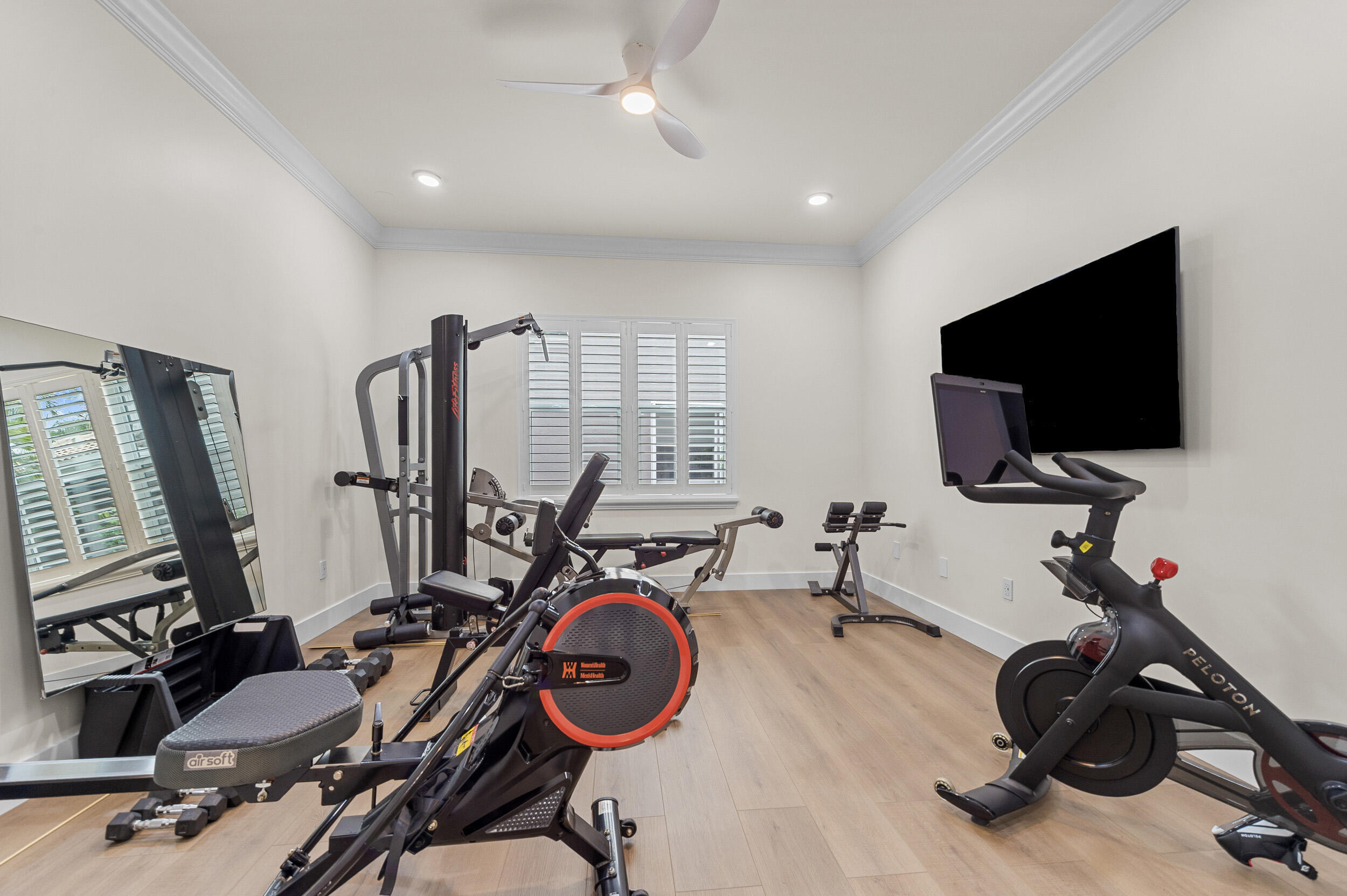 8680 Daystar Ridge Point Boynton Beach, FL 33473 - Photo 13 of 25 a view of a room with gym equipment