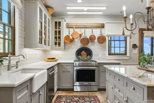 a bedroom with a bed and ceiling fan