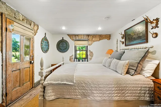 a view of a swimming pool with an outdoor seating and a garden