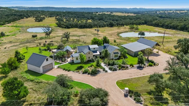 a view of a garden with an ocean view