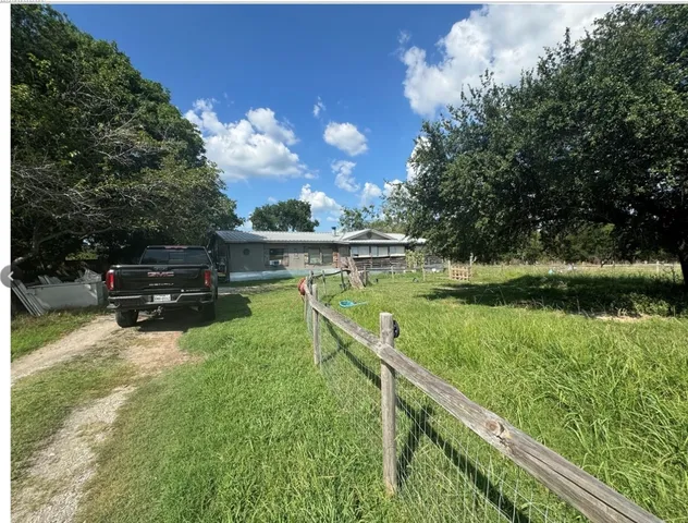a view of a terrace with a back yard