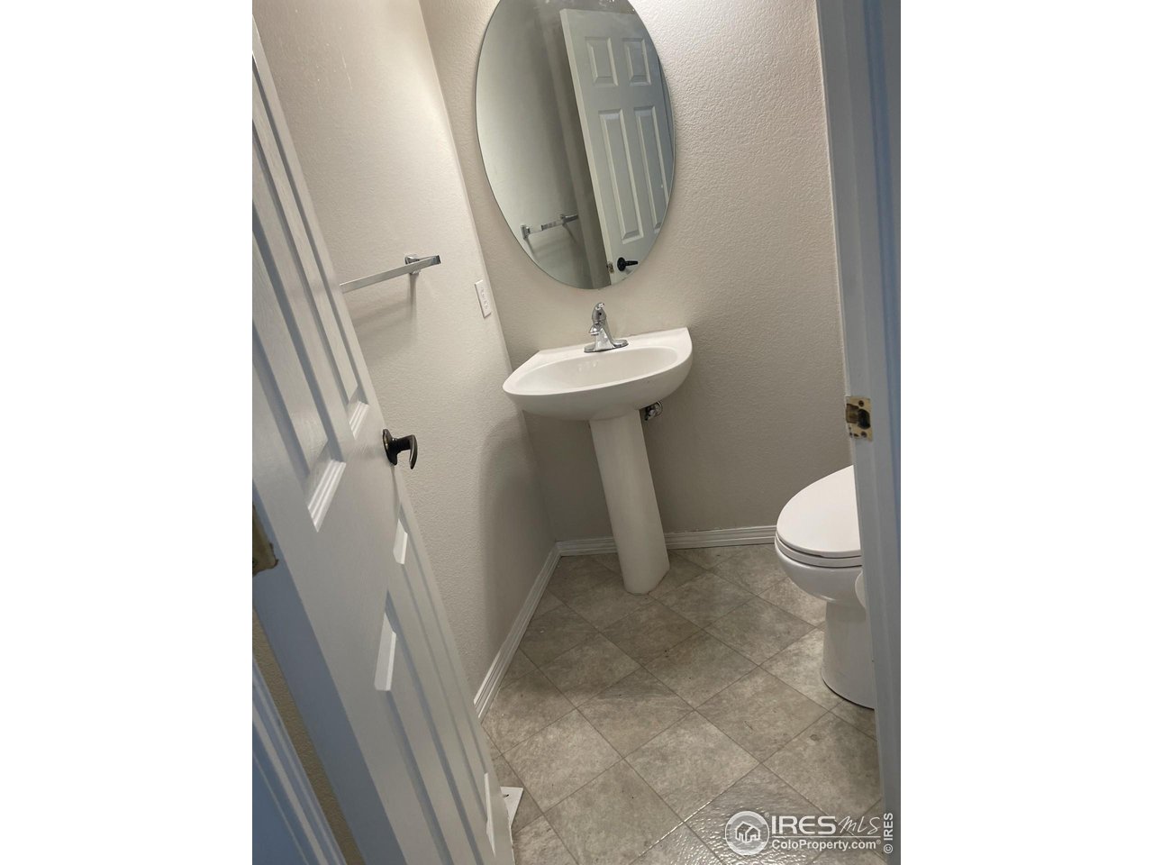 613 Rider Ridge Drive Longmont, CO 80504 - Photo 11 of 34 Main floor powder room