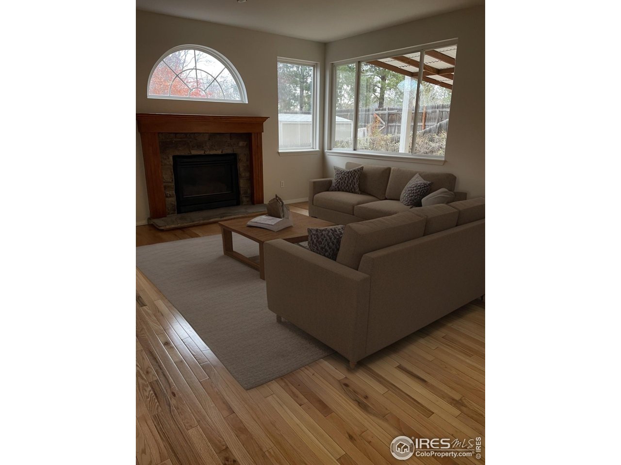 613 Rider Ridge Drive Longmont, CO 80504 - Photo 6 of 34 Stone fireplace in family room
