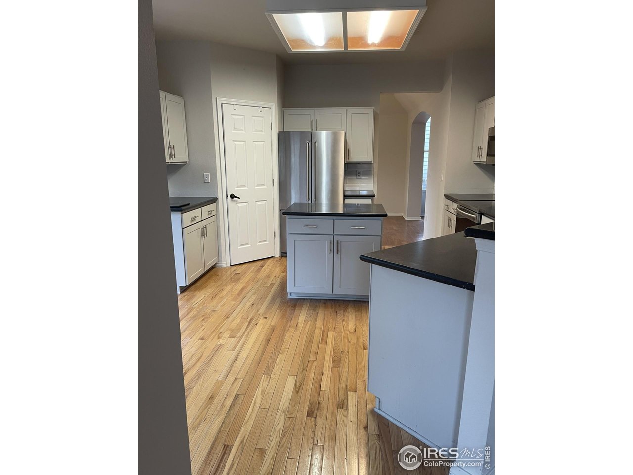 613 Rider Ridge Drive Longmont, CO 80504 - Photo 7 of 34 Kitchen with center island