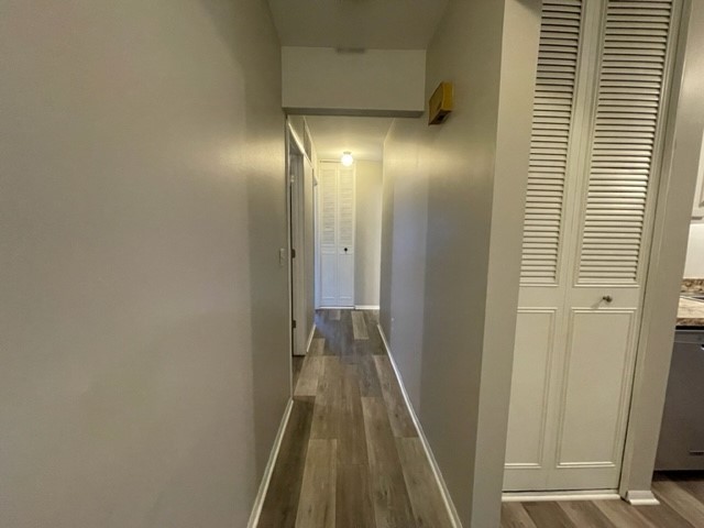 10 Ingleshire Road Montgomery, IL 60538 - Photo 13 of 26 a view of a hallway with wooden floor and staircase