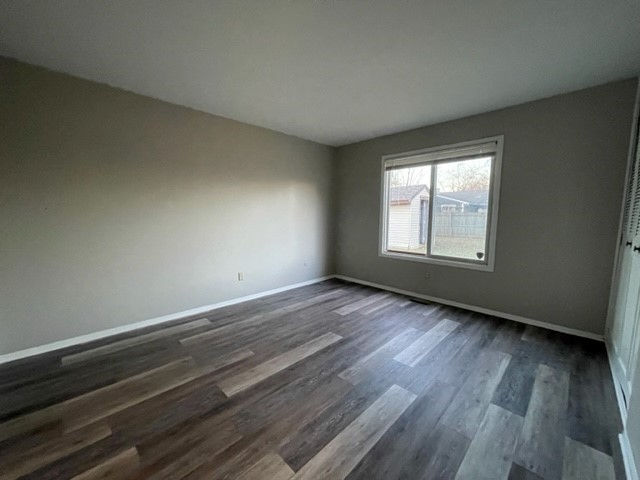 10 Ingleshire Road Montgomery, IL 60538 - Photo 14 of 26 a view of an empty room with wooden floor and window