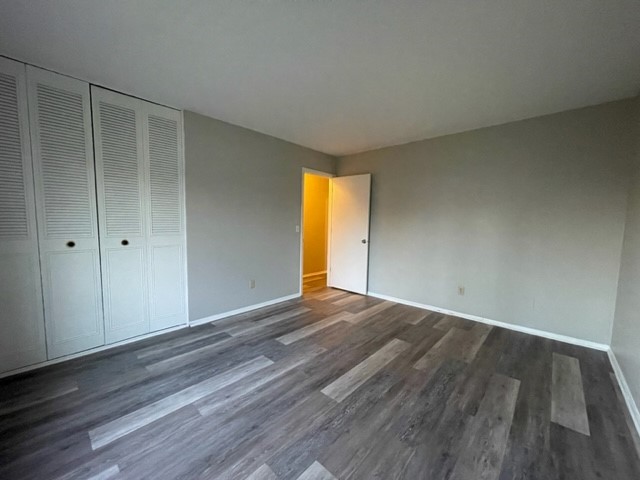 10 Ingleshire Road Montgomery, IL 60538 - Photo 15 of 26 a view of an empty room with wooden floor and window