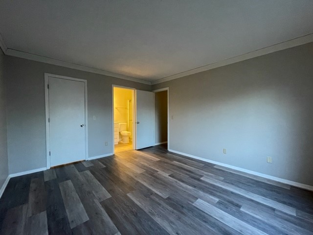 10 Ingleshire Road Montgomery, IL 60538 - Photo 20 of 26 a view of an empty room with wooden floor and a window