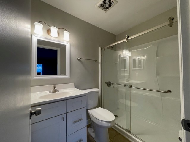 10 Ingleshire Road Montgomery, IL 60538 - Photo 21 of 26 a bathroom with a sink toilet a mirror and shower